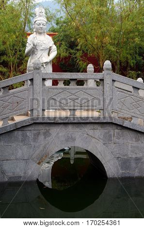 White marble Guanyin statue on the bridge in Nanyue Damiao temple Heng Shan Hunan China
