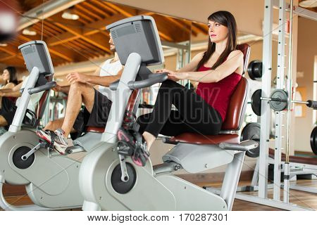     People working out on a stationary bike