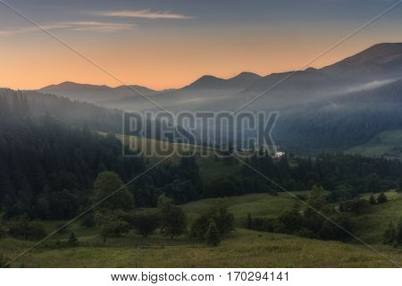 Ukraine. Carpathians. Summer morning at the village Dzembronya