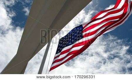 US Flag over USS Arizona Memorial at Honolulu, HI