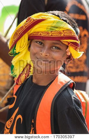 Georgetown Penang Malaysia - February 9 2017 : Young musician boy as a Hindu devotee taking part in the Thaipusam festival on February 9 2017 in Malaysia. Hindu festival to worship God Muruga.