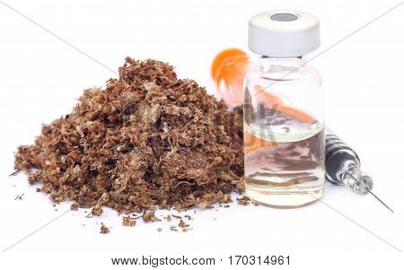 Medicinal cannabis with vial and syringe over white background