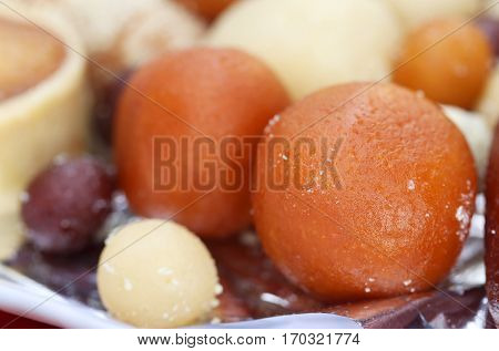 Close up of some popular Bangladeshi sweetmeats