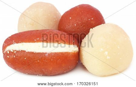 Close up of Popular Bangladeshi Sweetmeats over white background