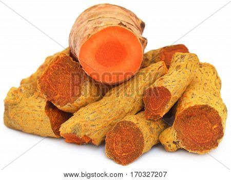 Close up of Dry turmeric over white background