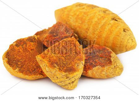 Close up of Dry turmeric over white background