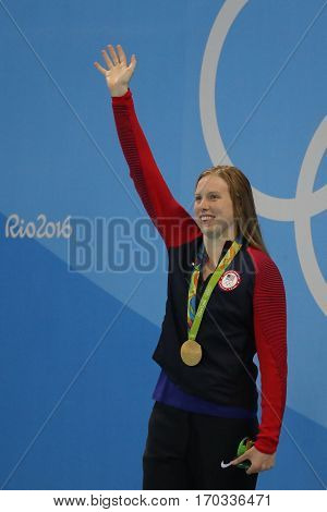RIO DE JANEIRO, BRAZIL - AUGUST 8, 2016: Olympic Champion swimmer Lilly King of the United States celebrates victory after Women's 100m Breaststroke Final of the Rio 2016 Olympic Games