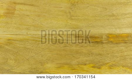 Texture mango wooden board background close up