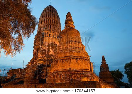 Main prang of the ancient Buddhist temple of Wat Ratcha Burana in the evening twilight. Ayutthaya, Thailand