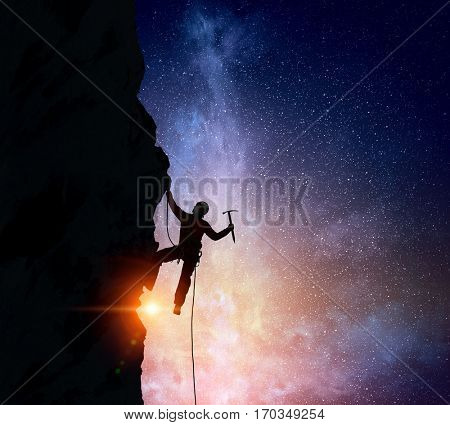 Extreme climbing is his adrenaline . Mixed media