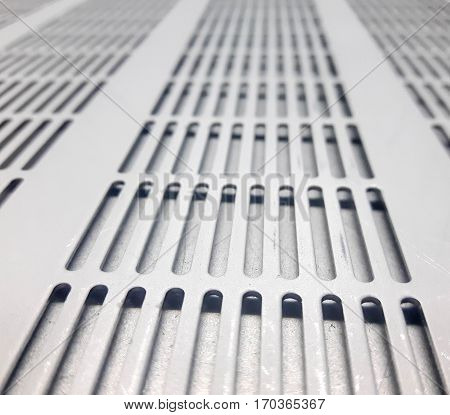 Nice implementation of a perforated metal background