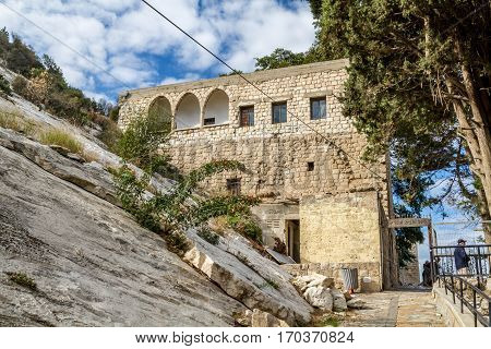 The Cave of Elijah with hebrew inscription above the entrance - Prophet Elijah memorable Mount Carmel in Haifa Israel