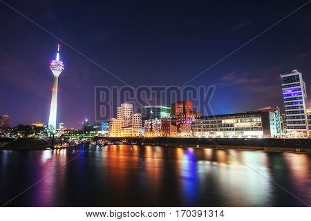 Night city landscape Dyusildorf. Media harbor. Germany