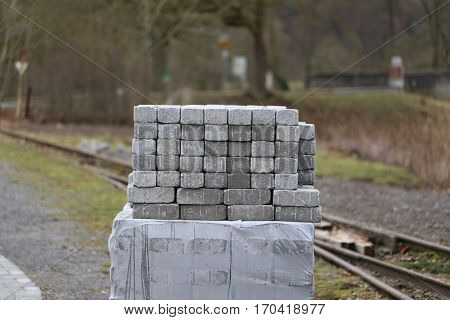Stack of bricks / Bricks neatly stacked against the wall
