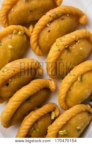 Gujiya - sweet dumplings made during the festival of holi and diwali, selective focus