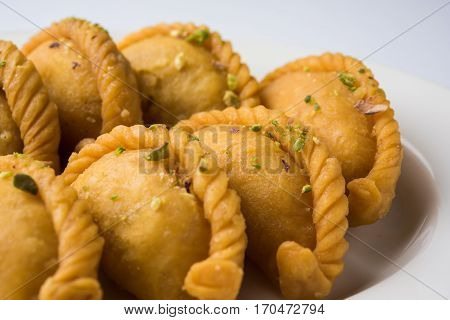 Gujiya - sweet dumplings made during the festival of holi and diwali, selective focus