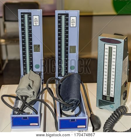 Blood pressure monitor devices with pump atteched