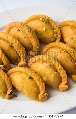 Gujiya - sweet dumplings made during the festival of holi and diwali, selective focus