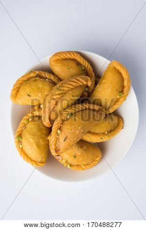 Gujiya - sweet dumplings made during the festival of holi and diwali, selective focus