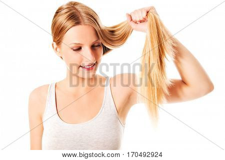 Blond hair. Beautiful woman with straight long hair.