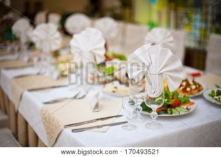 Festive table setting. Laying of a holiday table. Food background.