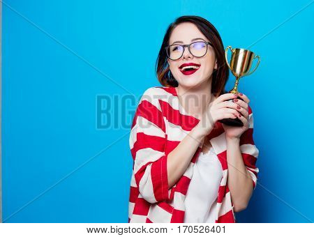 Young Smiling Woman With Cup Trophy
