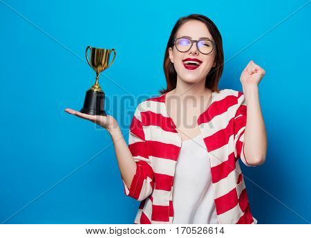 Young Smiling Woman With Cup Trophy