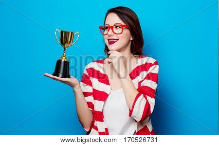 Young Smiling Woman With Cup Trophy