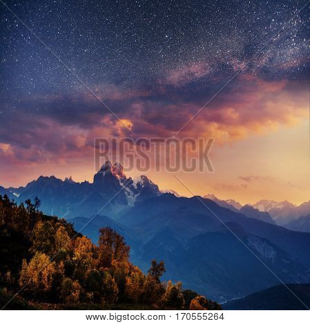 Snow-covered mountains in the mist. Autumn at Koruldi Lake. Europe, Georgia, Upper Svaneti, near mt. Ushba.