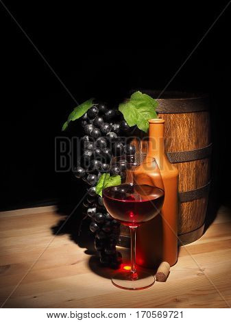 Glass Of Red Wine And Barrel On Wooden Table