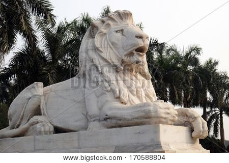 KOLKATA, INDIA - FEBRUARY 08: Antique Lion Statue at Victoria Memorial Gate, Kolkata, India, sculptured by Vincent Esch in Kolkata, West Bengal, India on February 08, 2016