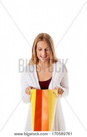 Young beautiful woman with some shopping bags.