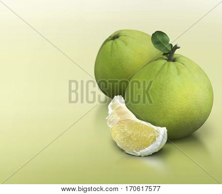 Green pomelo group on green solid background
