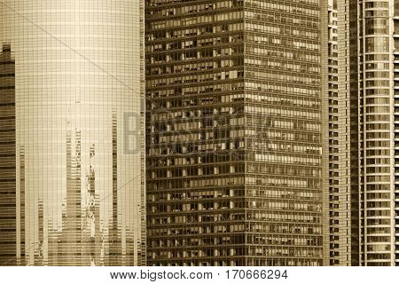 Pudong district skyscrapers in Shanghai China. Pudong is a district of Shanghai located east of the Huangpu River. Sepia toned photo