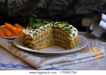 Pie Beef Liver With Onions And Tuschenym Markovka On A Plate Decorated With Mayonnaise. Liver Cake.
