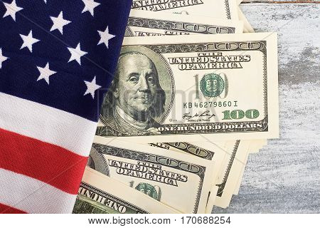 Money and flag of America. National stability and independence.