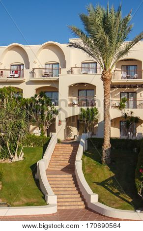 EGYPT, SHARM EL SHEIKH - JULY 19, 2015: Buildings and Area Hotel Jaz Belvedere in Sharm El Sheikh, Popular Center of a Beach Holiday and Diving, Red Sea, Summer, Egypt
