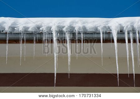 Remove dangerous icicles. Fines for snow and ice on roofs. Ice protection systems.