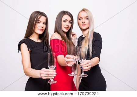Smiling Young Women Celebrating With Empty Glasses On The Party