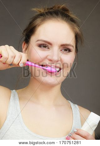 Woman Brushing Cleaning Teeth