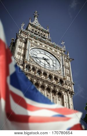 flags of UK and EU combined over icons of London - Brexit concept