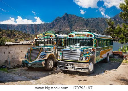 SAN PEDRO,GUATEMALA -DEC 24, 2015: Typical chicken bus in San Pedro on Dec 24, 2015. Guatemala. Chicken bus It's a name for colorful, modified and decorated bus in various latin American countries
