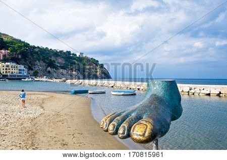 Ischia Italy - October 17 2008: A foot sculpture in the Lacco Ameno beach