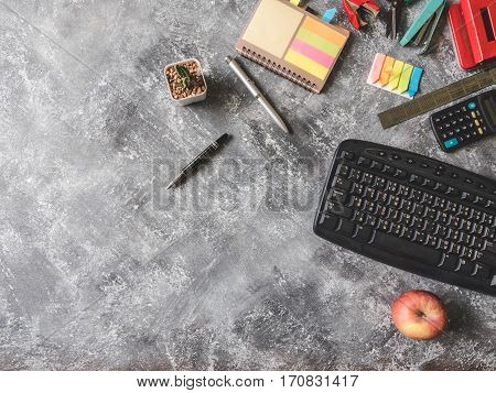 Top view of Office supplies on Grunge gray background Free space for text