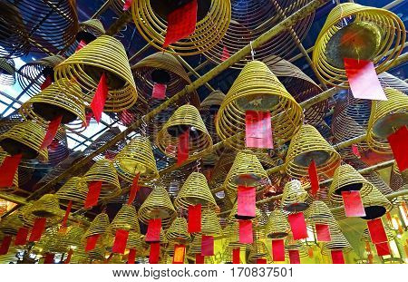 Incense sticks burn in the Man Mo Temple in Sheung Wan (Hong Kong) during the Chinese New Year