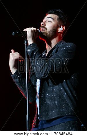 HUNTINGTON, NY-FEB 8: Joe Jonas of DNCE performs onstage at the Paramount on February 8, 2017 in Huntington, New York. 