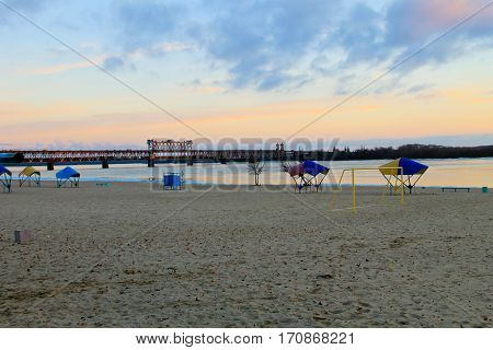 Bridge across river Dnieper at sunset in Kremenchug, Ukraine