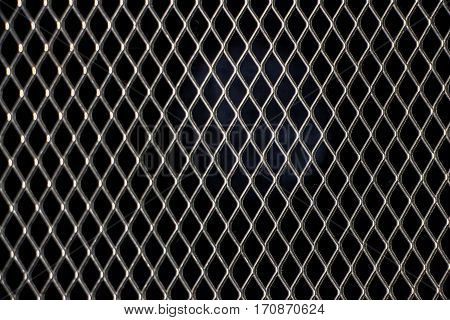 A metal grid. Abstract background texture of steel