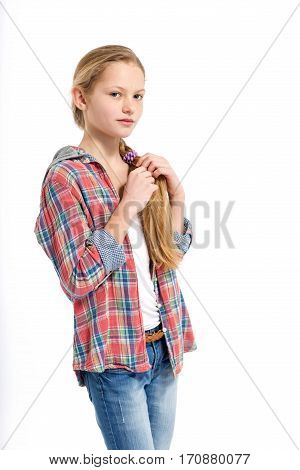 Portrait of young cute shy teenage girl on white background