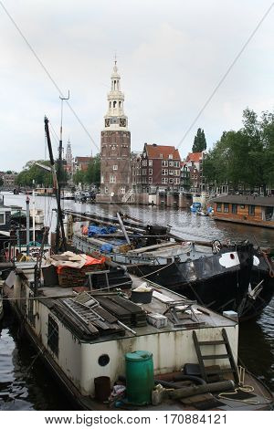 The Montelbaanstoren Is A Tower On Bank Of The Canal Oudeschans In Amsterdam